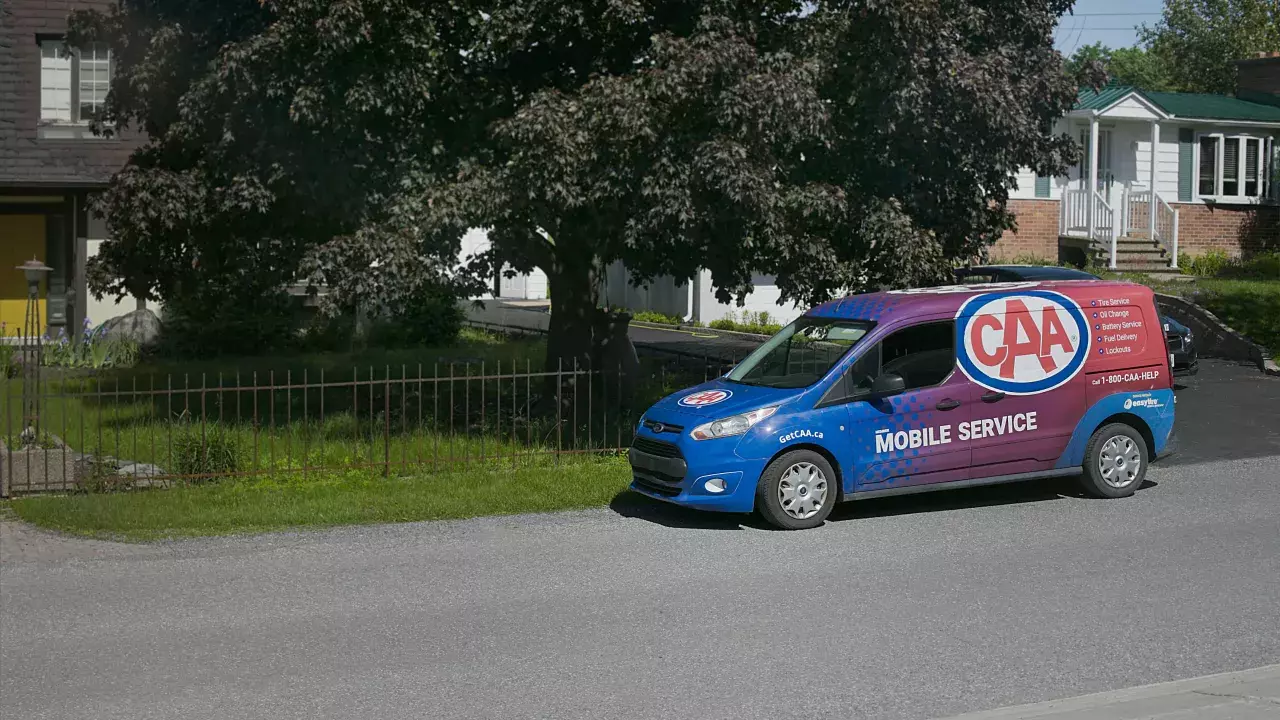 CAA's pit crew van parked in a neighbourhood