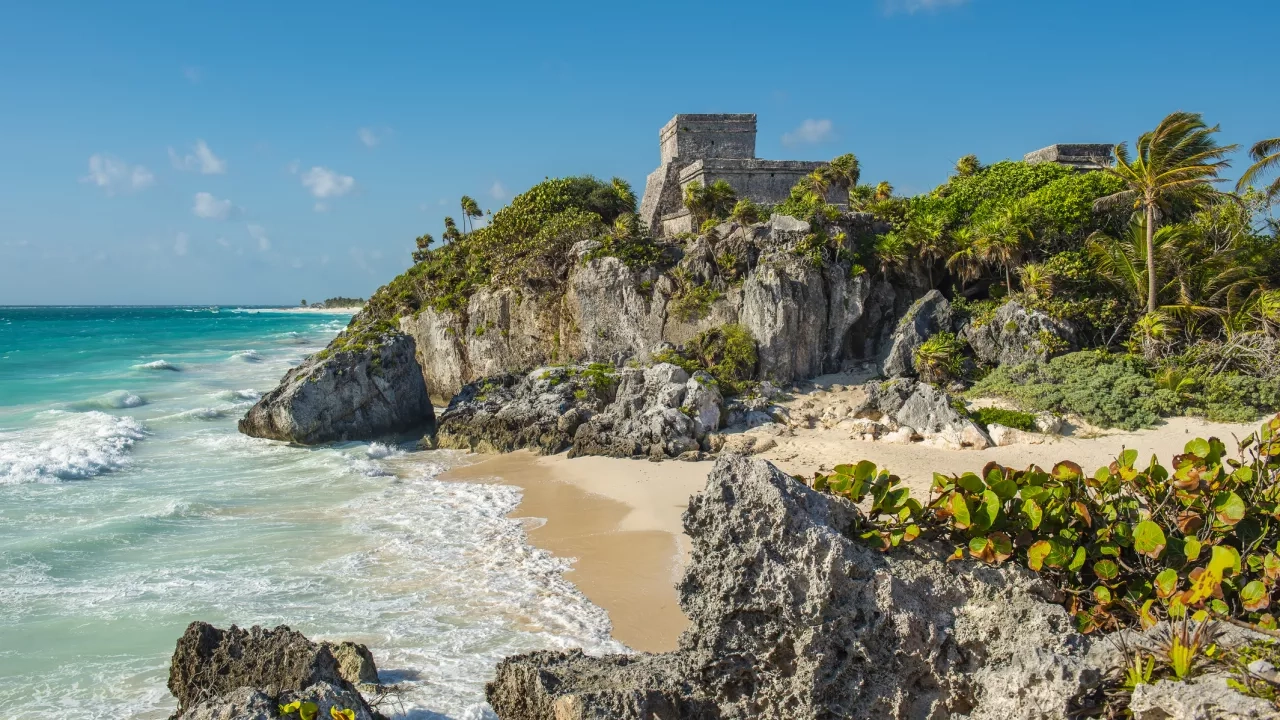 Mayan Ruins of Tulum, Mexico with sandy beach and water