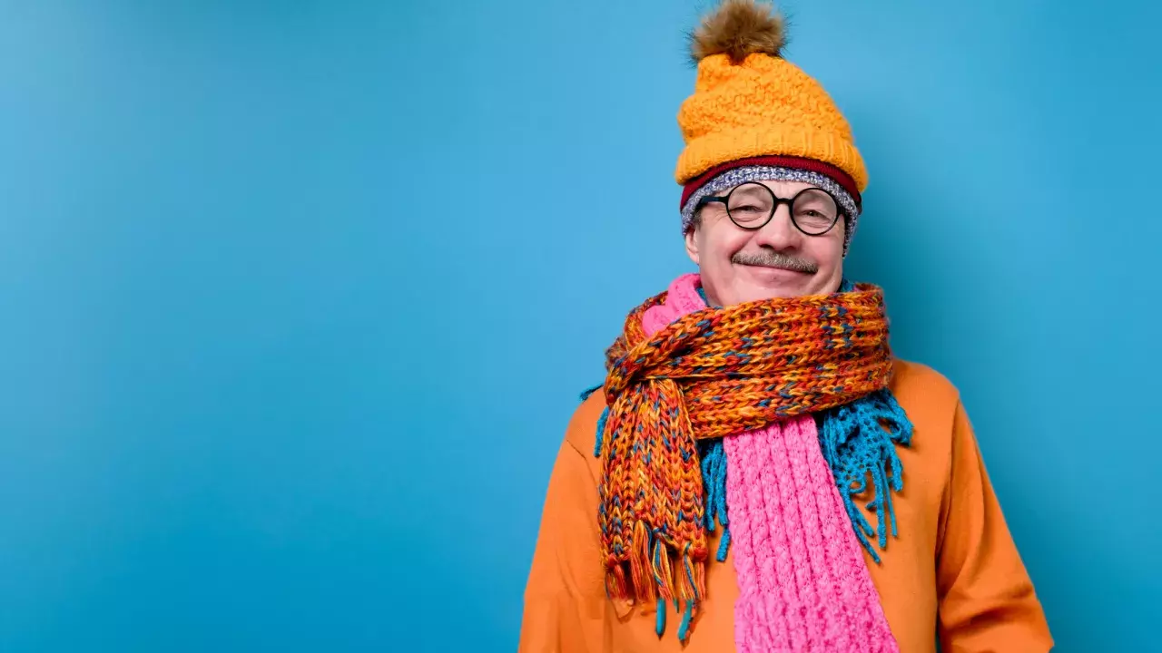 older man bundled up in winter clothing