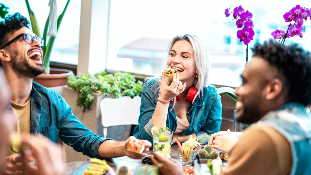 Group of friends eating at a restaurant