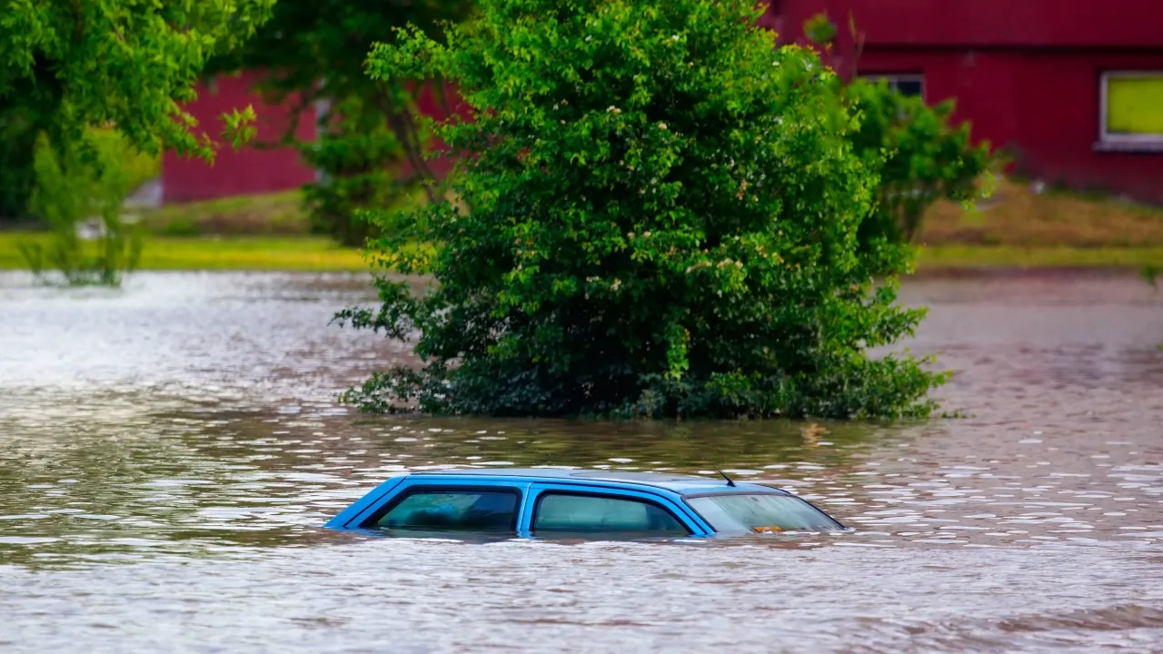 flooding, car stuck in water