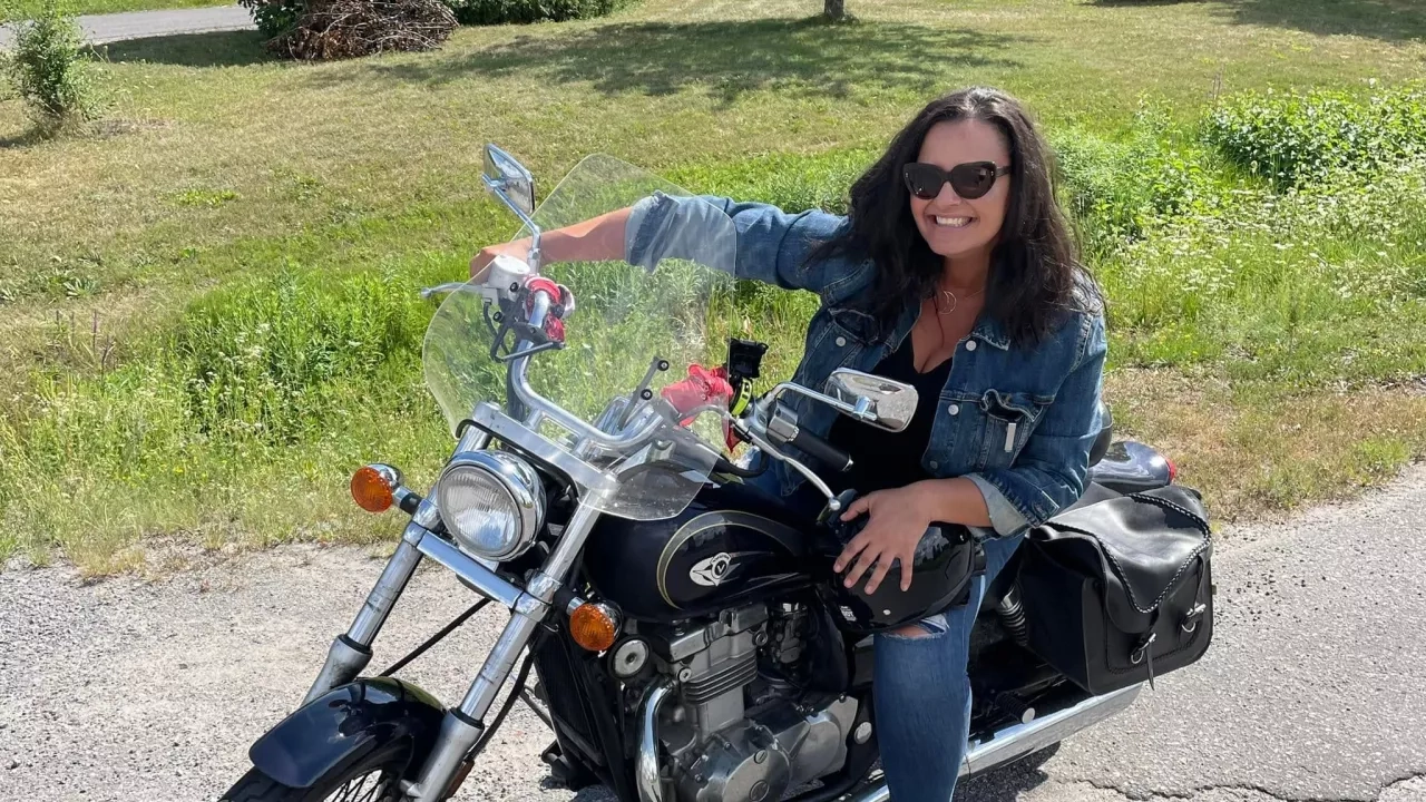 Sandra from 105.3 KiSS FM in Ottawa with her motorcycle going on a One Tank Road Trip