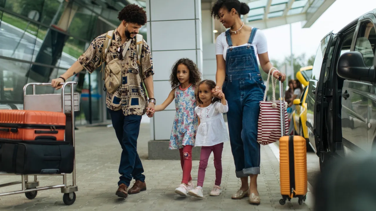 Family arrives at the airport ready to take the plane
