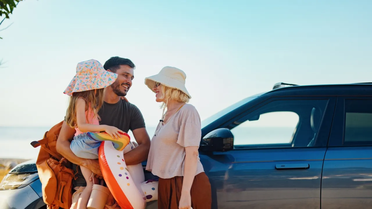 Happy Family Preparing for a Summer Vacation