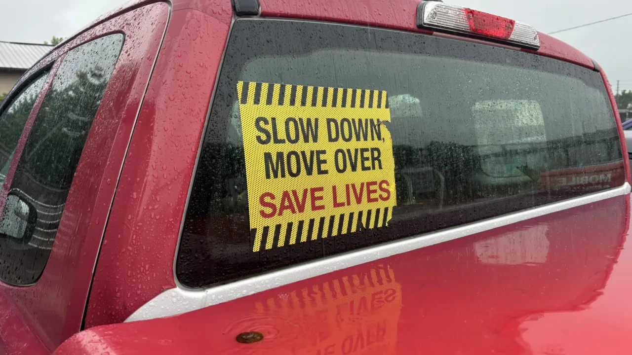 Slow Down Move Over Sign