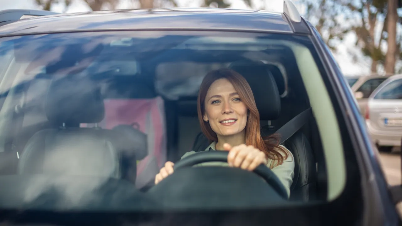 woman driving car