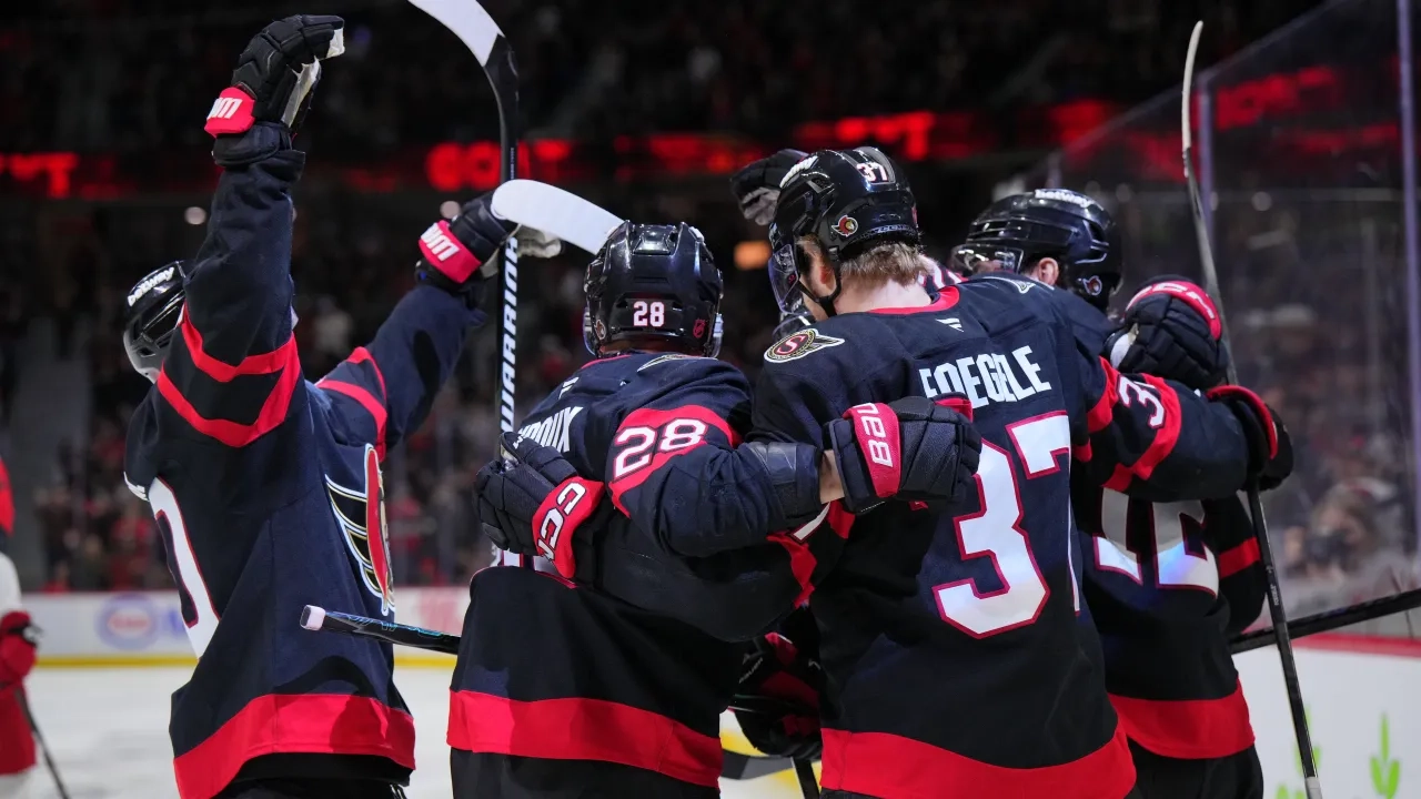 Photo shows Senators players celebrating