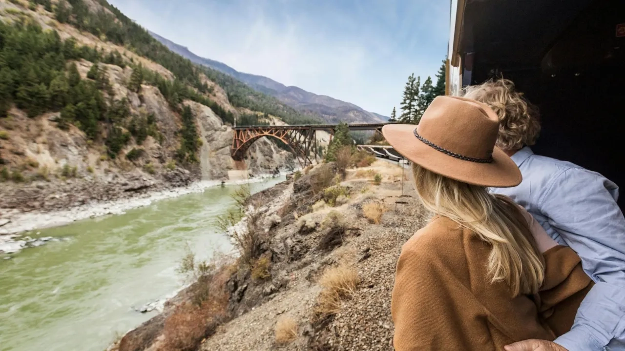 Couple looking out window on the Rocky Mountaineer