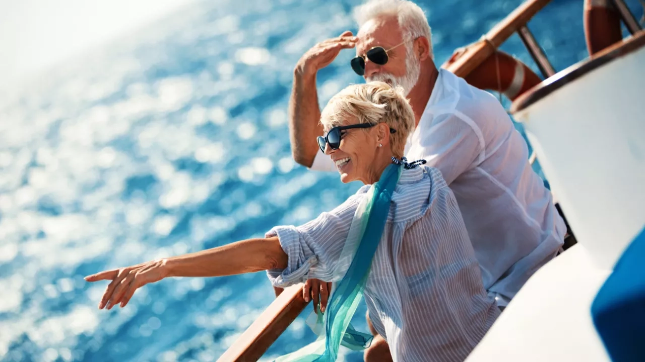 Senior couple on a sailing cruise