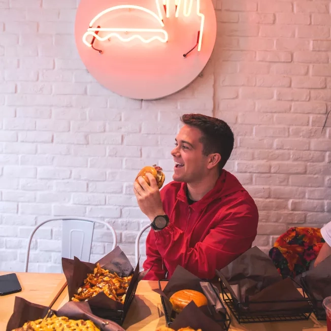 Carlo Santurbano eating a burger