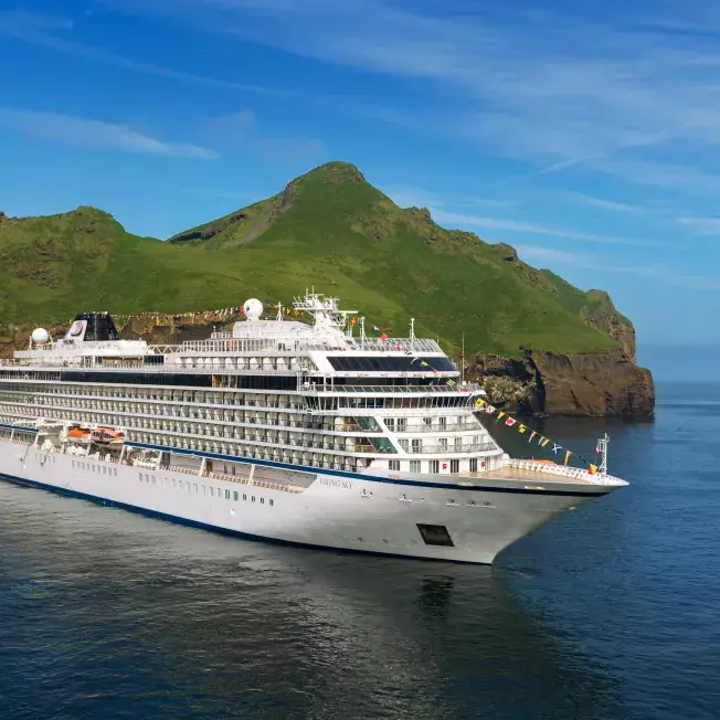 Viking cruise ship parked at a port in Iceland.