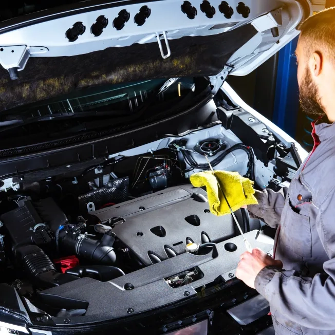 Checking the engine oil level. Auto Repair Shop or Auto Service