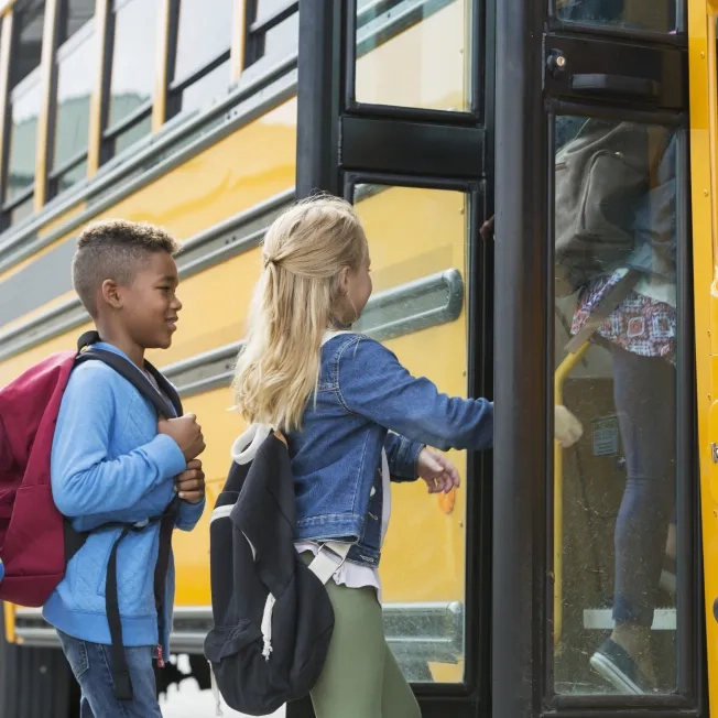 Kids boarding school bus