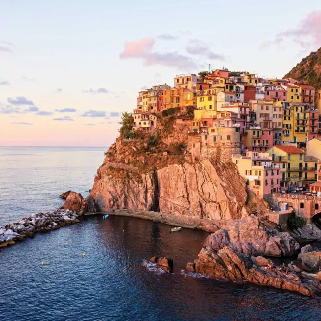 Cinque Terre seaside village in Italy at sunset