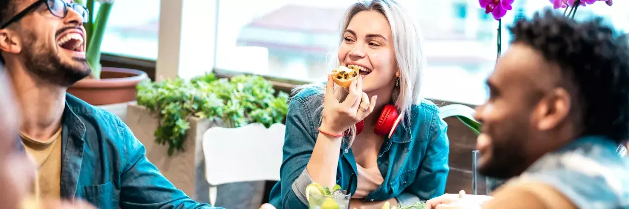 Group of friends eating at a restaurant