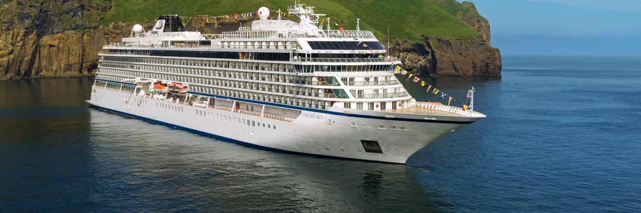 Viking cruise ship parked at a port in Iceland.