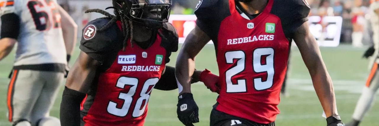 Ottawa REDBLACKS football player celebrate after making a big play