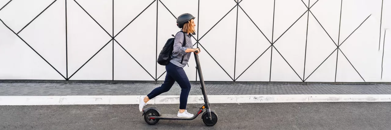 woman on a scooter
