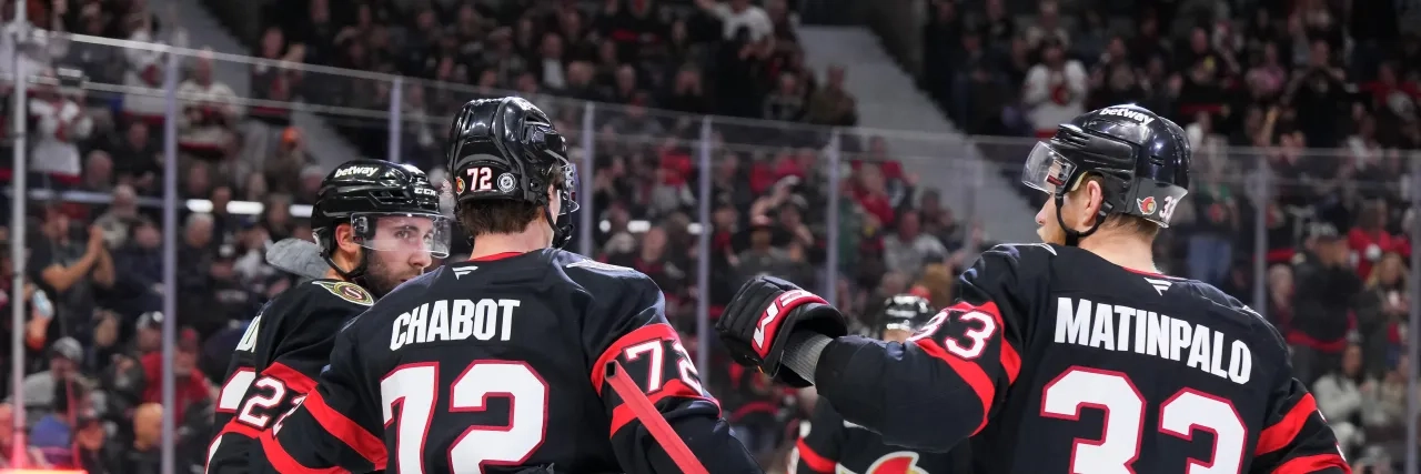Ottawa Sens players on ice