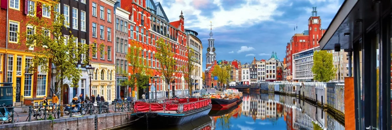 Colourful houses along the canal in Amsterdam