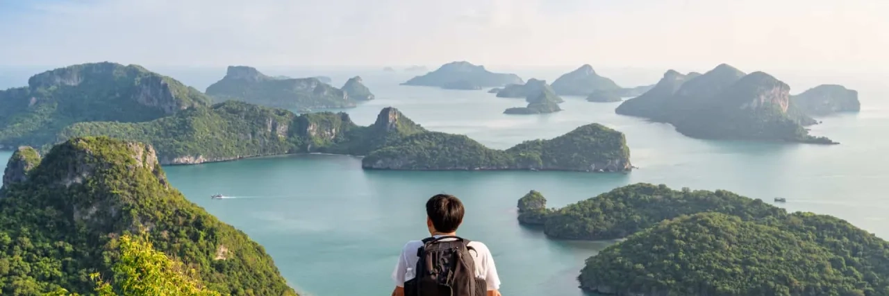 Man tourist on peak island