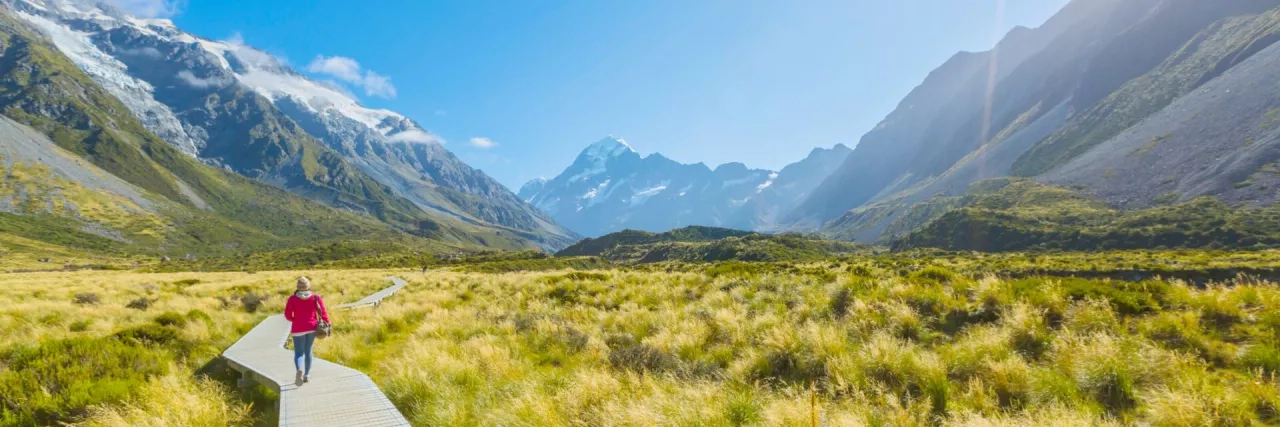 Woman enjoy travel at mount cook national park in south Island New Zealand