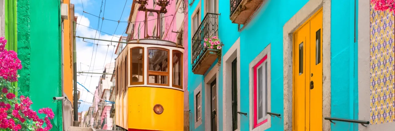 Yellow typical tram in Lisbon, Portugal