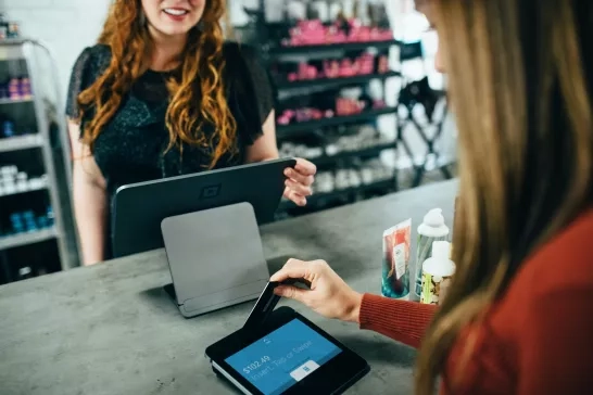 Customer buys products at retail store