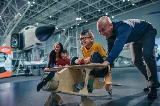 Family at a museum happy