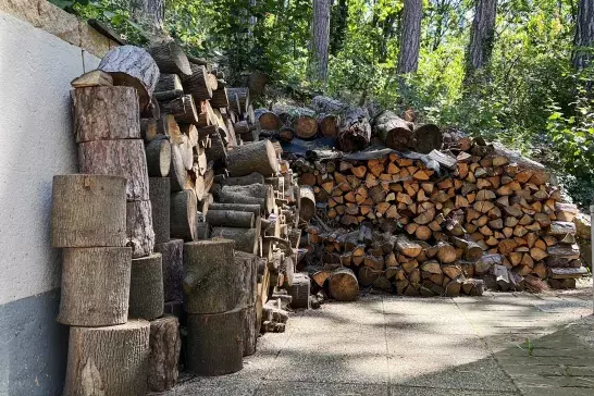 Stack of wood against an exterior wall