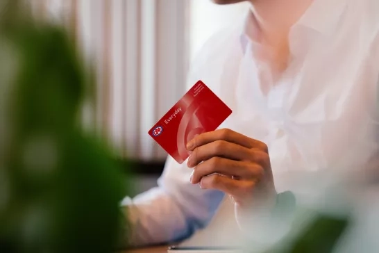 man holding CAA Everyday Membership card