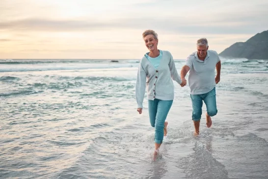 Old couple on the beach