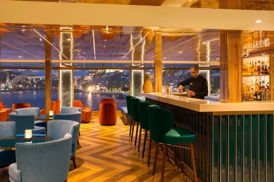 Luxurious lounge and bar onboard a Uniworld ship.