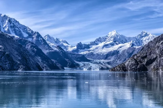 Glaciers reflecting on the water in Alaska