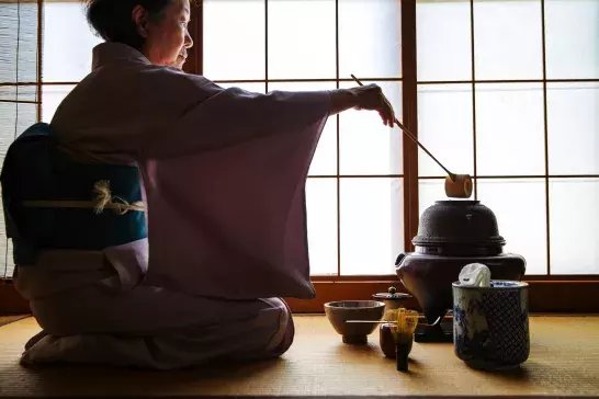 A woman performing a traditional Japanese Tea Ceremony, Sado, in Japan.