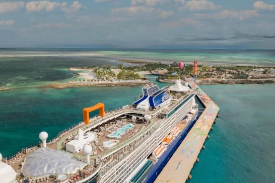 Aerial shot of a Celebrity Cruise ship docked at Perfect Day at Coco Cay
