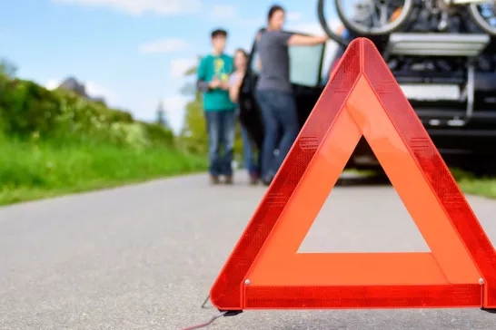 family waiting for roadside assistance