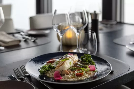 Fresh plate of seafood with wine onboard a Hurtigruten cruise.