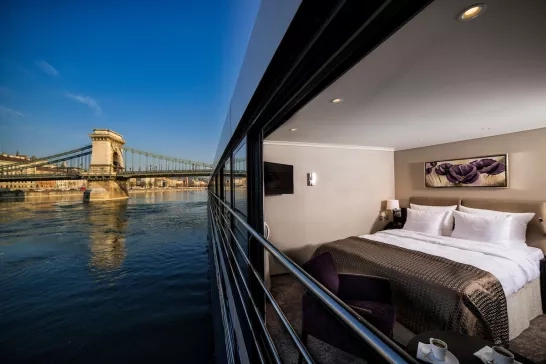 The view of a panoramic suite looking out at the river from an Avalon Waterways ship.