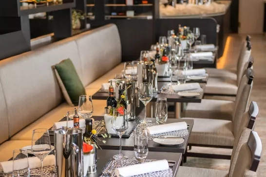 One of many dining rooms onboard Avalon Waterways set up for dinner.