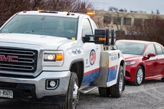 caa-tow-truck-towing-a-red-car