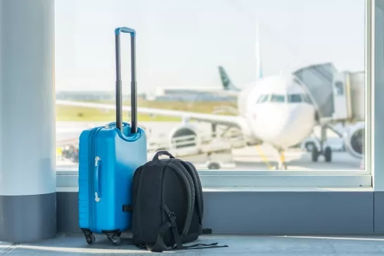 luggage and backpack at the airport