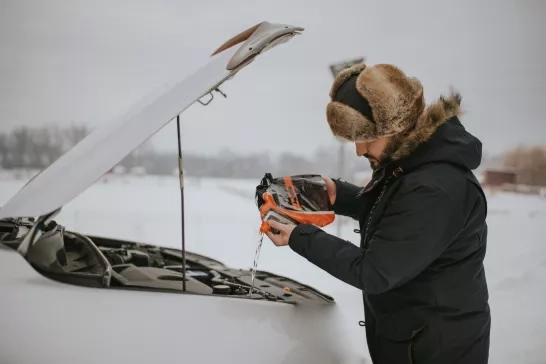 man preparing your car for winter