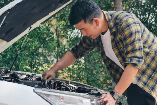 man open car hood and check up his car