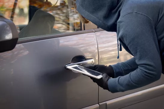 thief tries to break the car's security systems with tablet