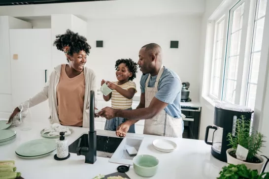 family doing the dishes