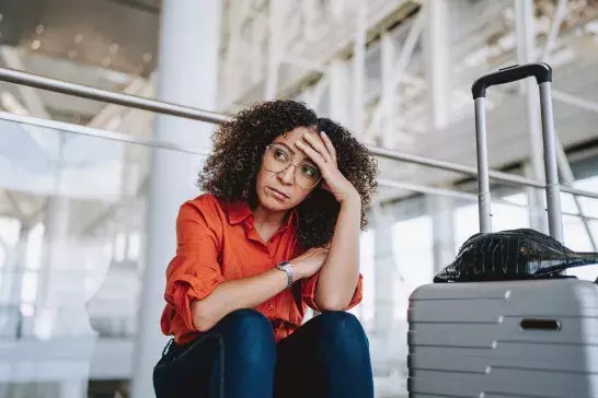 Woman waiting tired at the airport