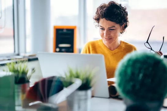 Photo of mature business woman is happy with today's business