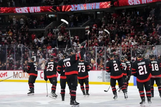 Senators Players on Ice Celebrating the win