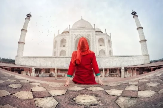 woman sitting outside the Taj Mahal